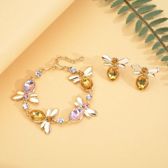 DESIGNER INSPIRIERT - 2er Set - Weißer Kristall Armband (ca. 19 cm + 5 cm Extender) und Ohrringe, goldfarben