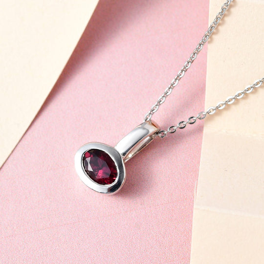 AA Rubellit Anhänger mit Kette, 925 Silber platiniert ca. 0.42 ct