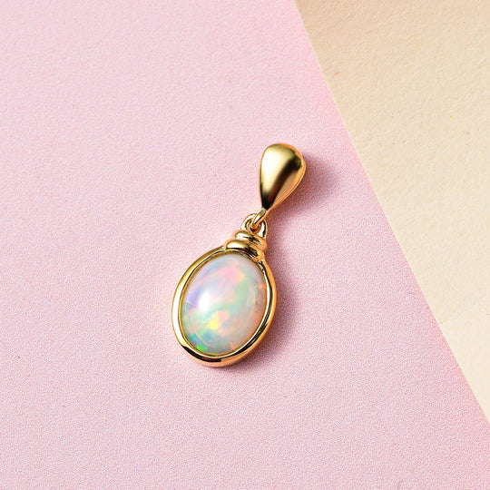 Natürlicher, äthiopischer Welo Opal Anhänger, 925 Silber vergoldet ca. 1.17 ct