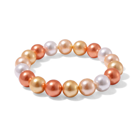 Flexibles, goldenes, weißes und grünes Muschelkernperlen-Armband