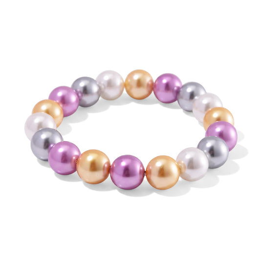 Flexibles, goldenes, weißes und grünes Muschelkernperlen-Armband
