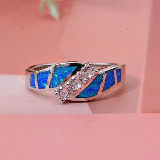Simulierter Blauer Opal, Weißer Zirkonia Ring 925 Silber rhodiniert