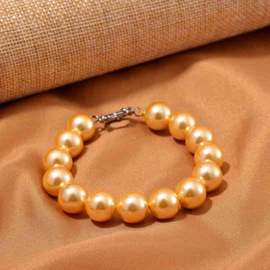 Goldene Muschelkernperle Armband ca. 20 cm Reiner Edelstahl