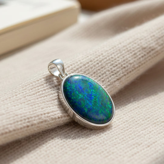 Rhapsody AAAA Boulder Opal Triplette Anhänger 950 Platin ca. 0.71 ct