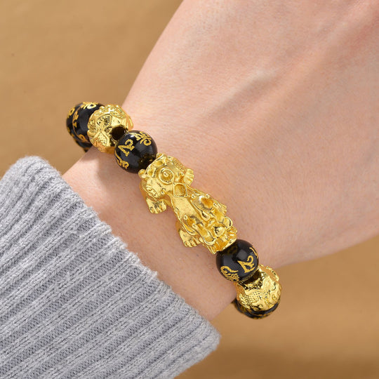 Schwarzer Obsidian Armband, flexibles (ca. 18-19 cm) Gelb ca. 180.00 ct