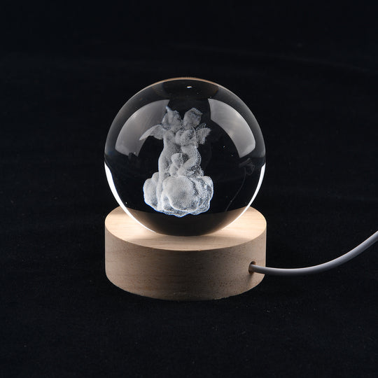 LIVMORE, LED-Glaskugel mit Amor-Motiv, Durchmesser 6 cm, Transparent