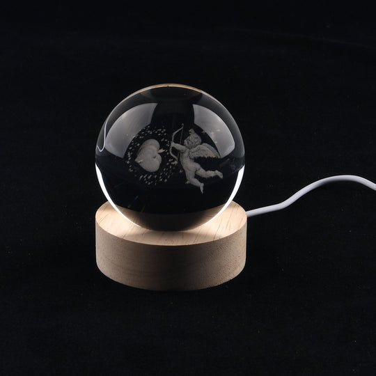 LIVMORE, LED-Glaskugel mit Amor-Motiv, Durchmesser 6 cm, Transparent