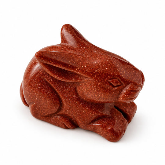 Brauner Goldfluss-Steinfigur in Delfinform 94.05 ct