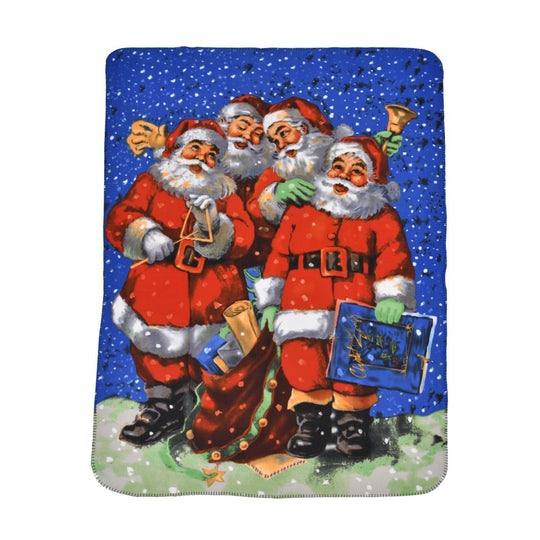 Winterzauber Klaus Fleece-Kuscheldecke, 4 Weihnachtsmänner, 130x170 cm