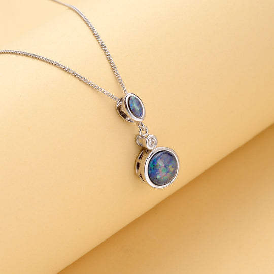 Boulder Opal Triplett-Anhänger mit Kette, 925 Silber rhodiniert ca. 1,74 ct