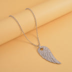 Weißer Kristall Flügel-Anhänger mit Kette, silberfarben