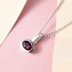 AA Rubellit Anhänger mit Kette, 925 Silber platiniert ca. 0.42 ct