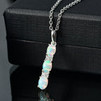 AA Natürlicher, äthiopischer Welo Opal, Weißer Zirkon Schmuckset 925 Silber platiniert und Edelstahl platiniert ca. 1,05 ct.