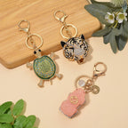 Katzenaugen Schlüsselanhänger Set aus Resin, emaillierte Legierung
