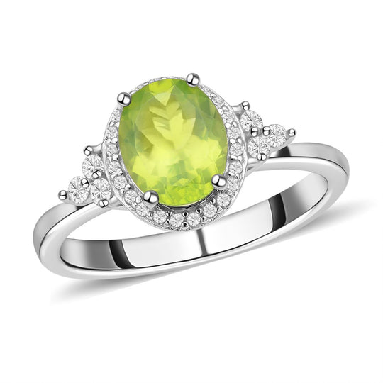 Natürlicher Peridot und weißer Zirkon Ring. 925 Silber rhodiniert ca. ca. 3.15 ct