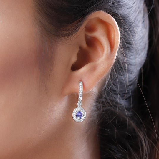 AAA Tansanit und weiße Zirkon-Ohrringe, 925 Silber platiniert ca. 1.27 ct