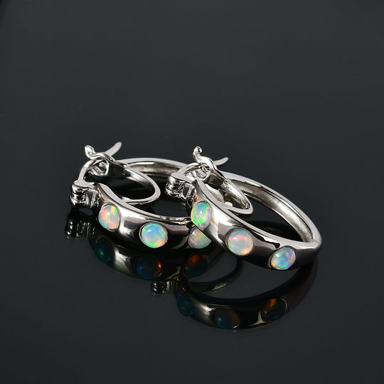 Natürlicher, äthiopischer Welo Opal Ohrringe 925 Silber rhodiniert ca. 0,53 ct.