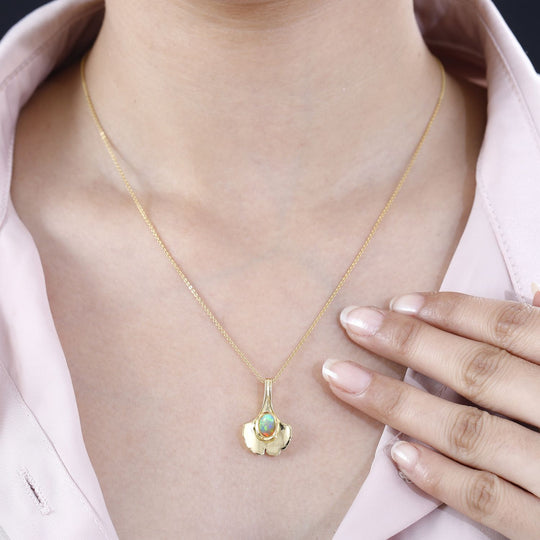 AA Natürlicher, äthiopischer Welo Opal Anhänger 925 Silber vergoldet ca. 0,53 ct.