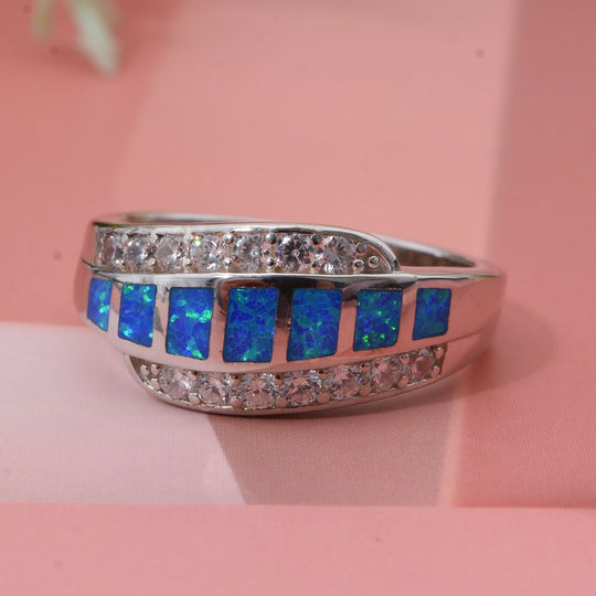 Simulierter Blauer Opal, Weißer Zirkonia Ring 925 Silber rhodiniert