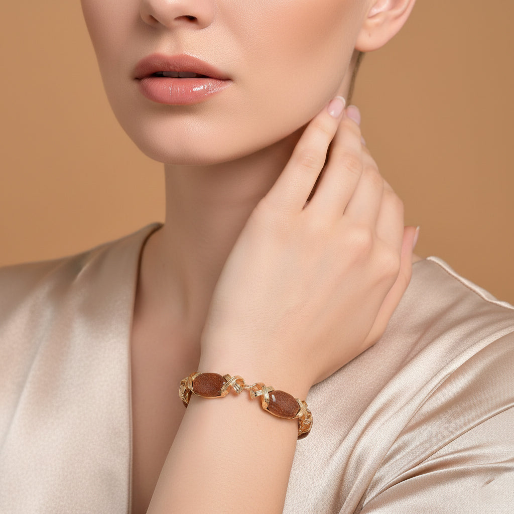 Sonnenstein Armband, ca. 15.25 cm + 5 cm Extender, gelb vergoldet ca. 65.00 ct