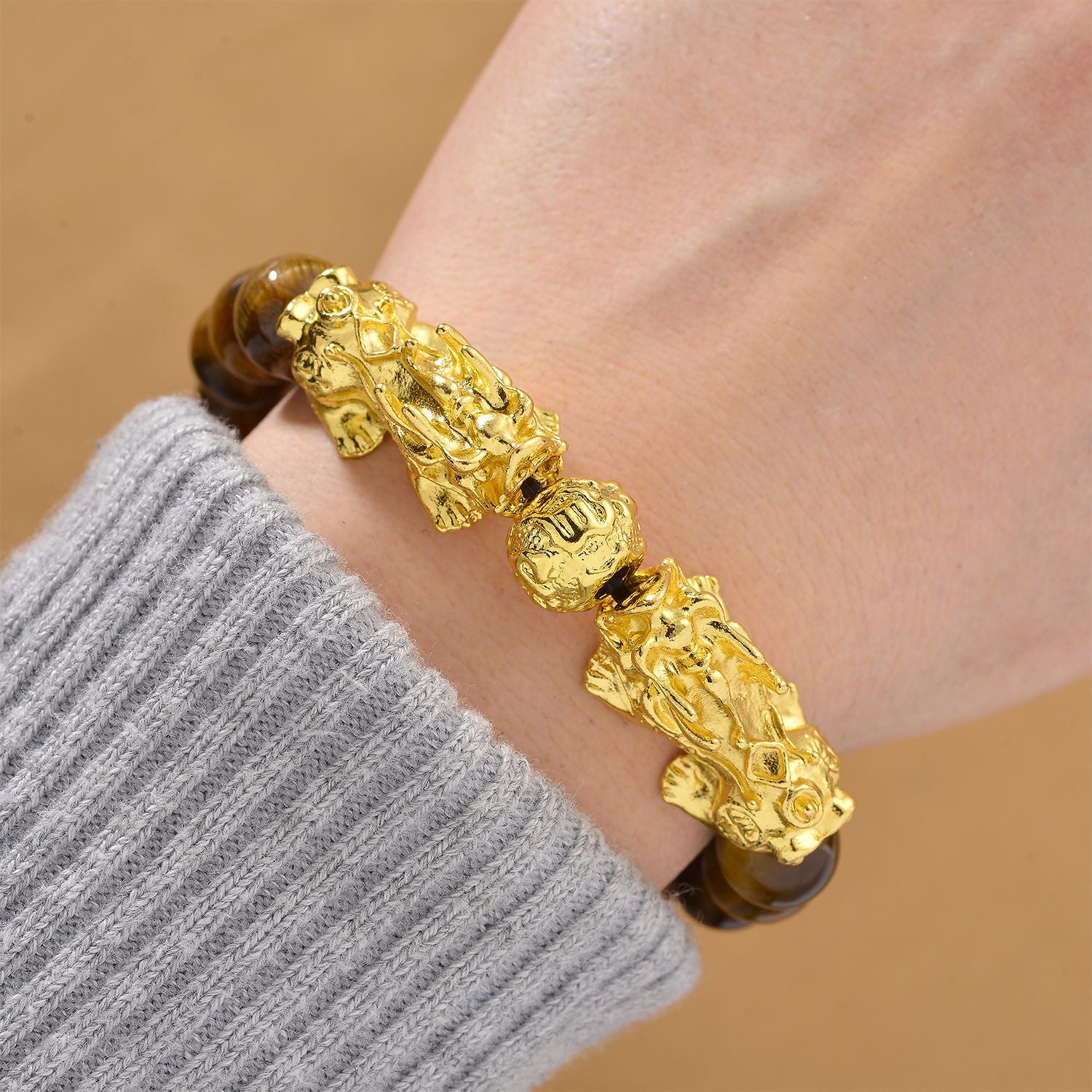 Tigerauge Armband, flexibel, vergoldet ca. 150,00 ct.