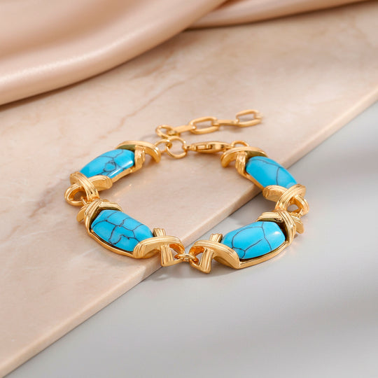 Blauer Howlit Armband, ca. 15.25 cm + 5 cm Extender, gelb vergoldet ca. 65.00 ct