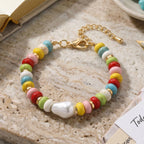 Weiße Muschelkernperle, Howlit Armband, ca. 18 cm + 5 cm Extender, goldfarben