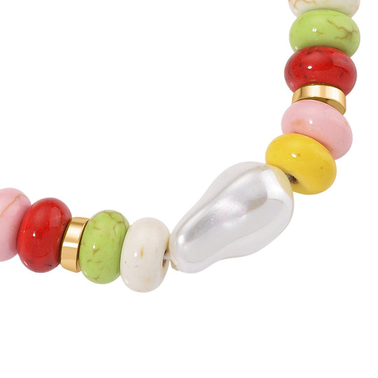 Weiße Muschelkernperle, Howlit Armband, ca. 18 cm + 5 cm Extender, goldfarben