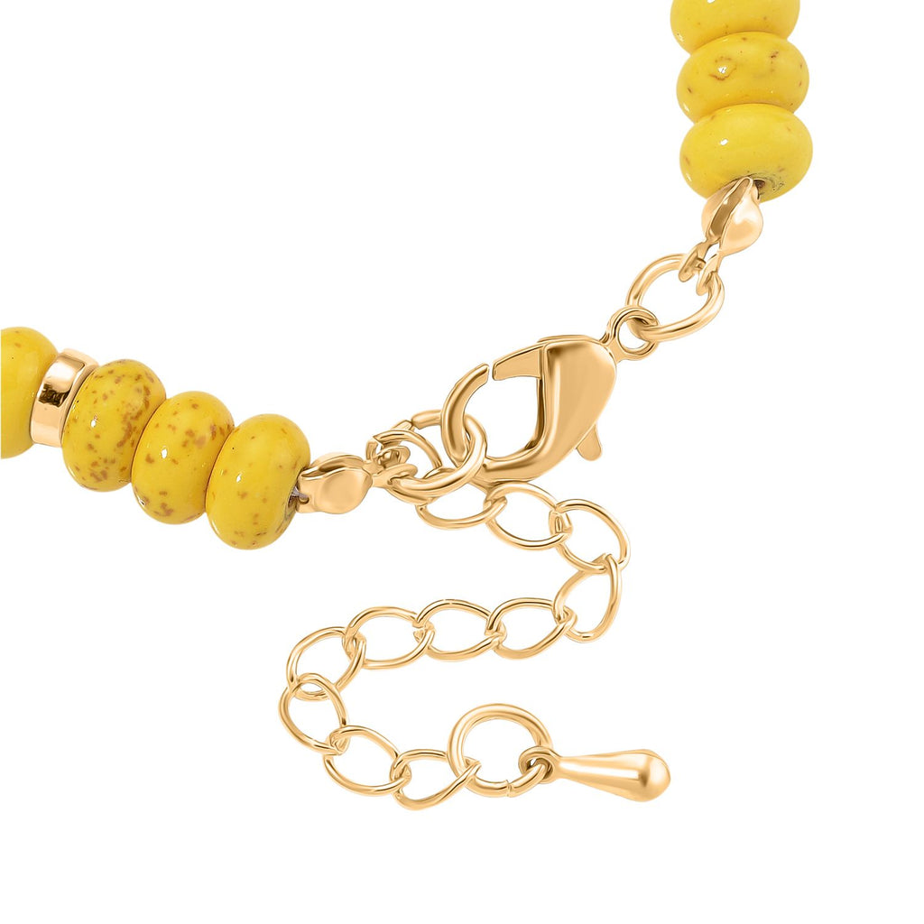 Weiße Muschelkernperle, Gelber Howlit Armband, ca. 18 cm + 5 cm Extender, goldfarben