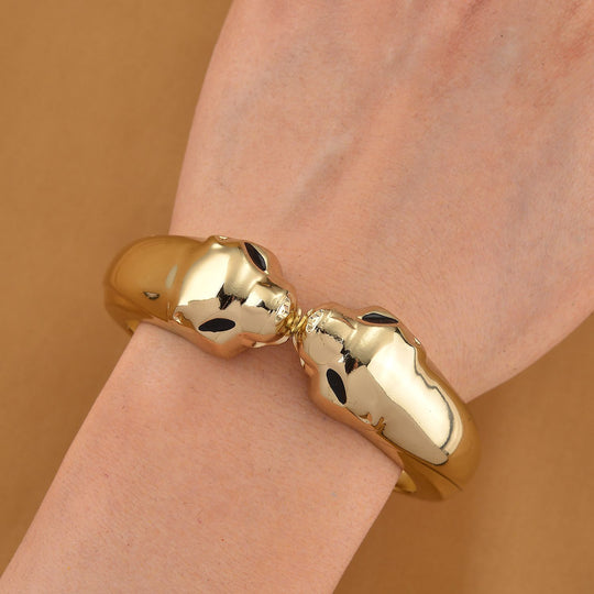 Statement-Armreif im Panther-Design, ca. 18 cm, goldfarben