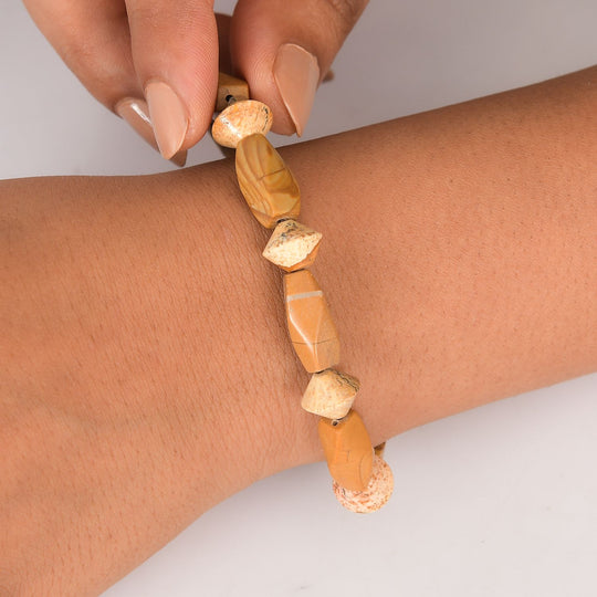 Erdnuss Holz Jaspis Armband Flexibel (18 cm), ca. 104.00 ct