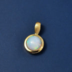 D'Joy AA Natürlicher, äthiopischer Welo Opal Anhänger 925 Silber 750 Gelb Vergoldet ca. 0.75 ct