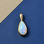 D'Joy AA Natürlicher, äthiopischer Welo Opal Anhänger 925 Silber 750 Gelb Vergoldet ca. 0.54 ct