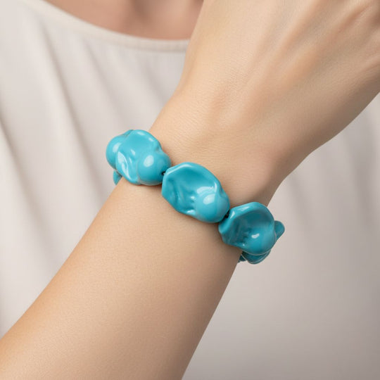 Pfaufarbene Muschelperle (23x27 mm) Armband, flexibles (Größe 19-20 cm)