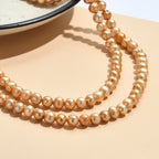 Goldfarbene gefärbte Perle (7.5-8.5 mm) Halskette ca. 107 cm