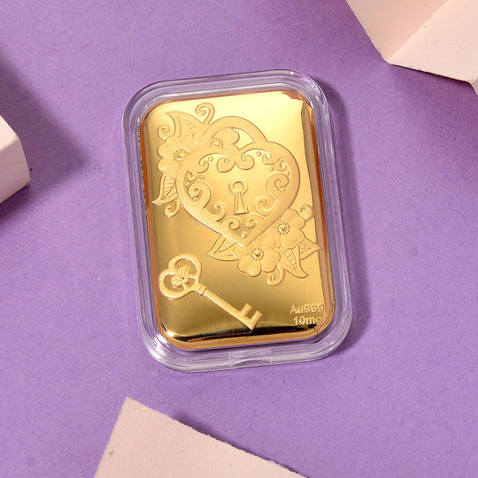 EXKLUSIVES GESCHENK - 999er Goldfolie mit Herzschloss und Schlüssel 10mg