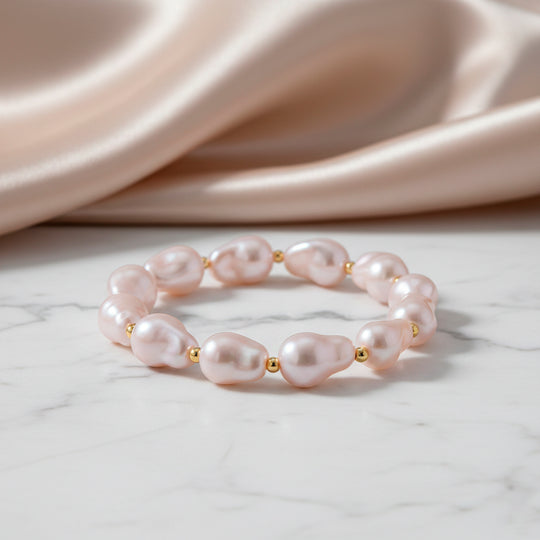 Rosa Muschelkernperle (10x14 mm) Armband, Flexibles (ca. 17-18.5 cm), Reine Legierung gelb vergoldet