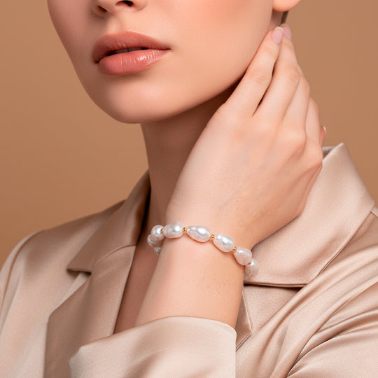 Rosa Muschelkernperle (10x14 mm) Armband, Flexibles (ca. 17-18.5 cm), Reine Legierung gelb vergoldet