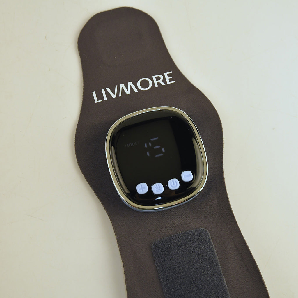 Livmore EMS Low-frequency pulse wrist wrap - Grey 1. Material: Polyester, spandex 2. Voltage: Input DC 5V, output 3.7V 3. Power: Output power 6W 4. Battery capacity: 1200 mA (included) 5. Functions: 6 modes, 19 intensity Settings, graphene 3 heating Sett