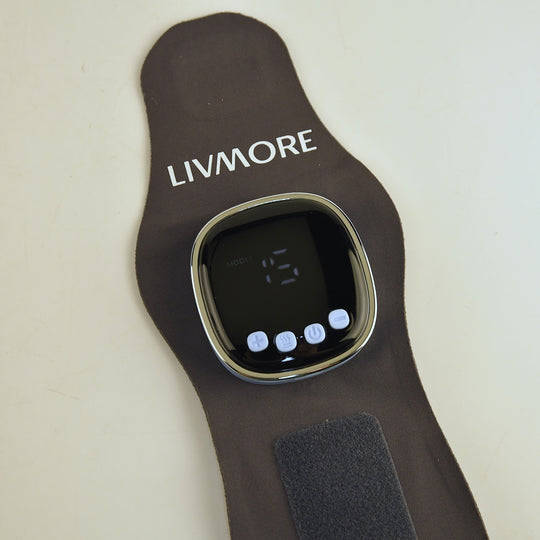 Livmore EMS Low-frequency pulse wrist wrap - Grey 1. Material: Polyester, spandex 2. Voltage: Input DC 5V, output 3.7V 3. Power: Output power 6W 4. Battery capacity: 1200 mA (included) 5. Functions: 6 modes, 19 intensity Settings, graphene 3 heating Sett