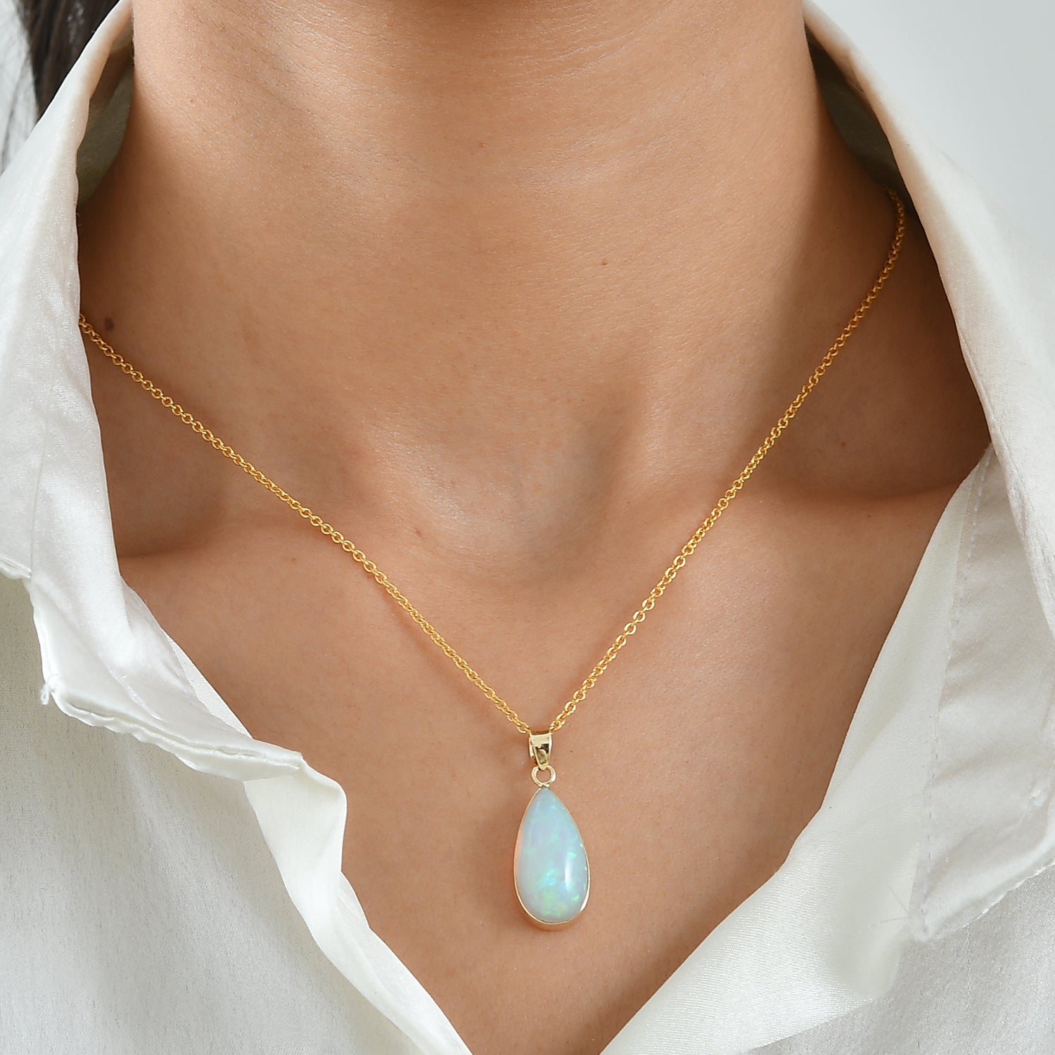 AAA Natürlicher, äthiopischer Welo Opal (Tropfen 20x10mm) Anhänger 375 Gold ca. 5.84 ct