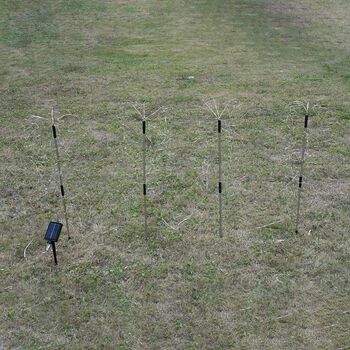 Set aus 4 solarbetriebenen Gartenlichtern in Feuerwerksform, 8 Leuchtmodi, 80 cm