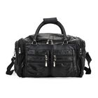 Patchwork-Reisetasche aus Schafleder mit 6 Außentaschen und Schulterriemen, 51x29x28 cm, Schwarz