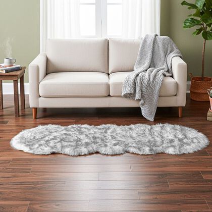 LIVMORE - Kunstfell-Teppich im Dip-Dye-Look mit Schaumstoffunterlage, 60x180 cm, Schwarz