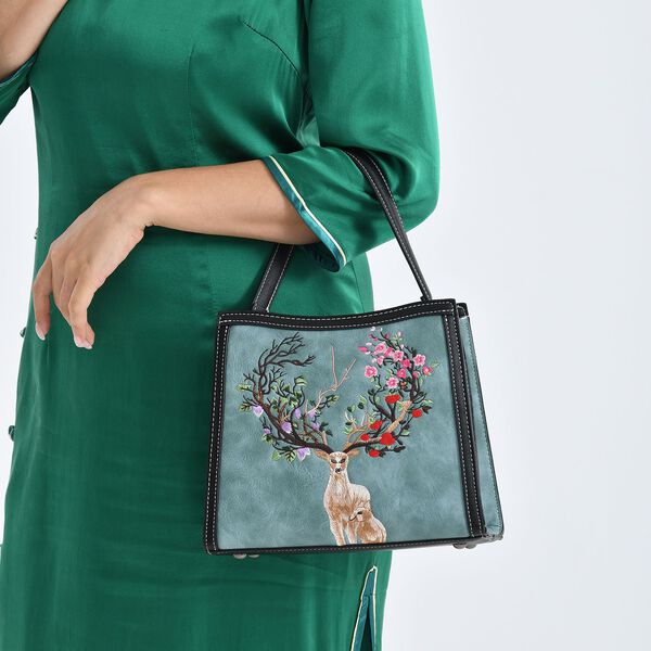 "PU Embroidered crossbody bag Color: Blue Size:  25*11*21cm   Wall: PU Lining: Polyester Exterior:zipped-1,pocket-1 Interior: zipped-2,slid-1 Long Shoulder strap:130cm " image number 3