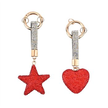 Set aus 2 roten Schl&uuml;sselanh&auml;ngern mit Stern und Herzmustern