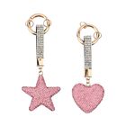 Set aus 2 rosa Schlüsselanhängern mit Stern- und Herzmustern