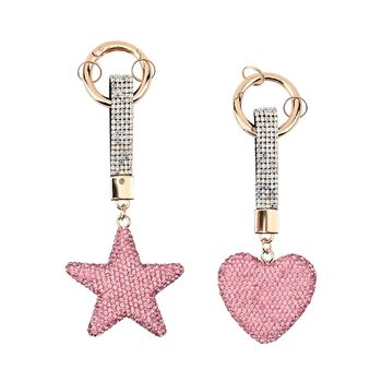 Set aus 2 rosa Schl&uuml;sselanh&auml;ngern mit Stern- und Herzmustern