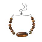 Flexibles gelbes Tigerauge Bolo-Armband, 15-22 cm, Edelstahl ca. 70.00 ct