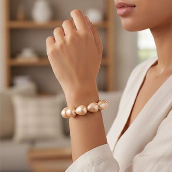 Flexibles goldenes Tropfen Muschelkernperle Armband